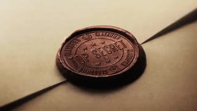 Image qui montre de la cire avec dessus écrit top secret